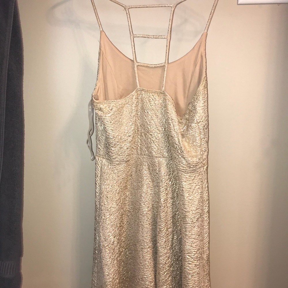 Gold, unique boutique dress